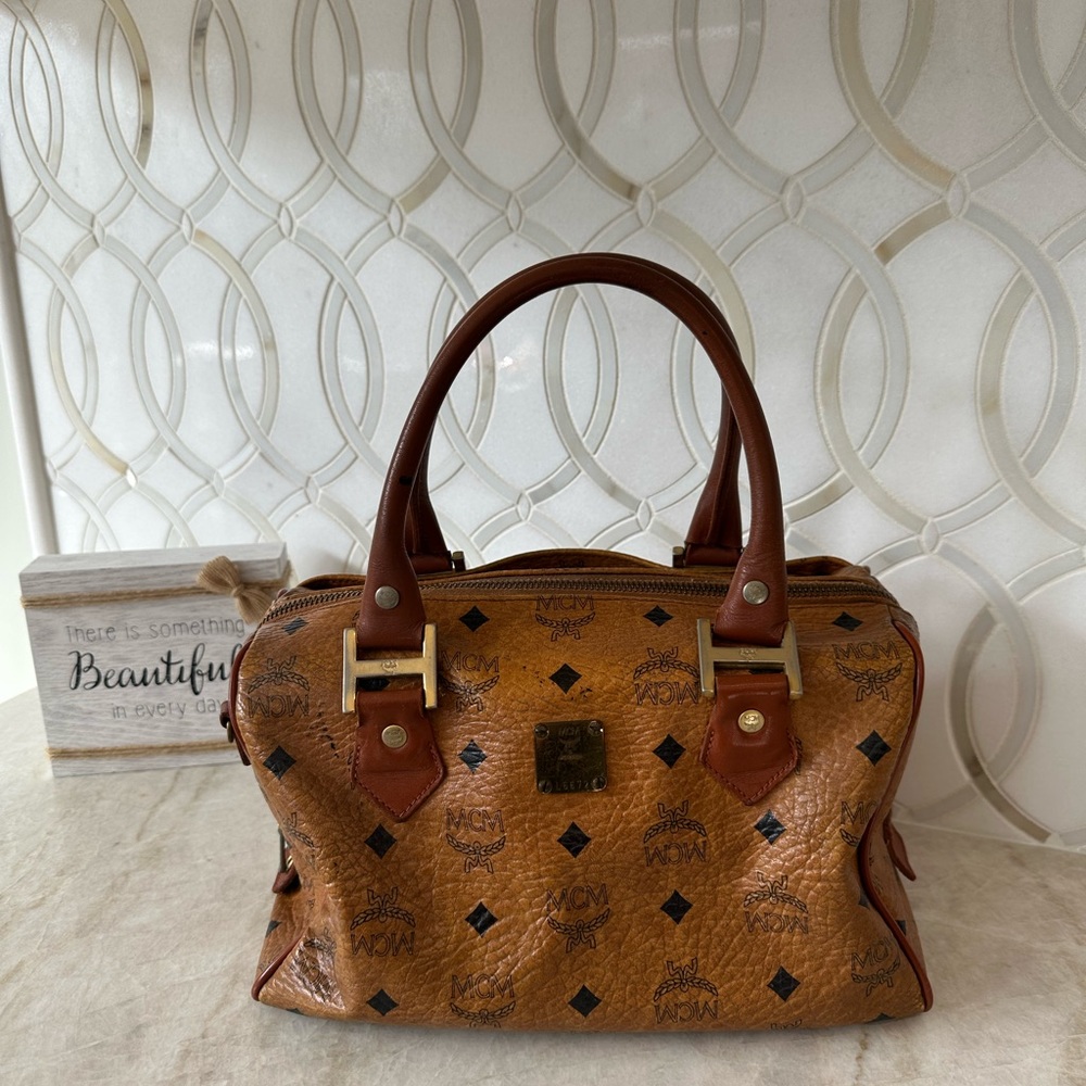 MCM Brown Shoulder Bag with Logo Pattern and Gold Accents